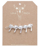 Silver hair clip palm